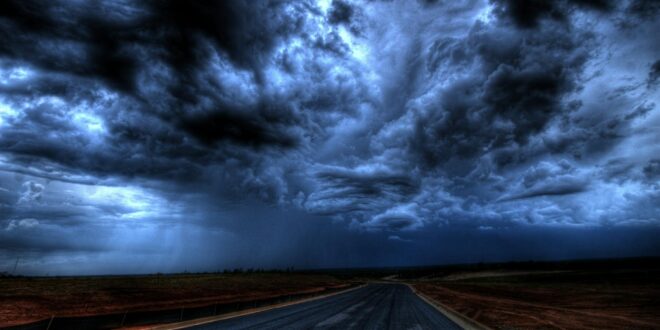 road under cloudy sky