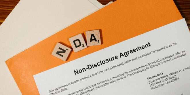 white printer paper on brown wooden table